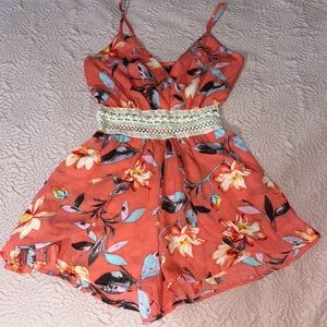 Gorgeous orange with flowers, XS romper.